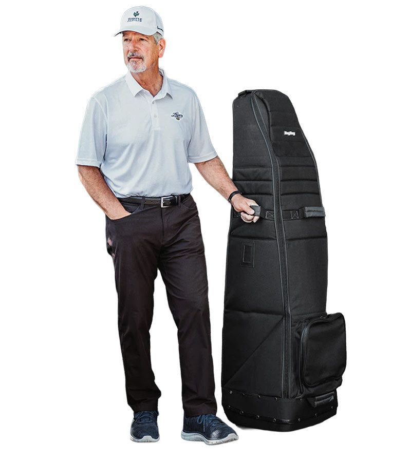 Bagboy Freestyle Travel Cover in Black/Charcoal standing upright next to man