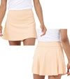 Birdie & Ace Everyday Tour Women's Golf Skort in peach cream - front and back views