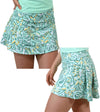 Birdie & Ace Everyday Tour Women's Golf Skort in a tropical leaves all-over - front and back views