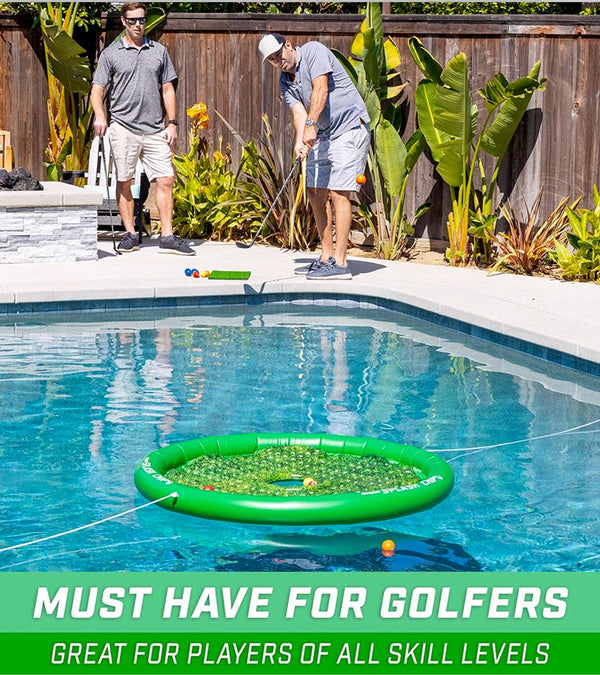 GoSports Splash Floating Golf Green - view of an outside pool with 2 men playing. 1 man is chipping a golf ball towards the floating circular green floating in the pool.