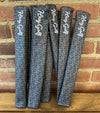 Hazy Golf All Over Sticks Cover- 8 covers against a brick wall