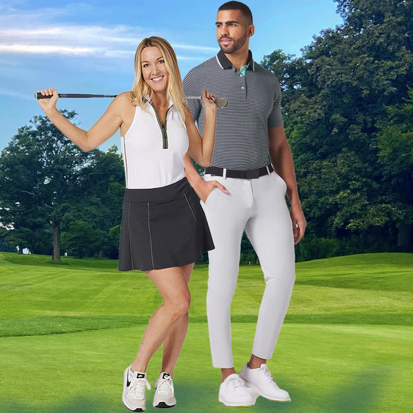 Male model in  a puma golf polo shirt and pants & female model wearing a Pirdie Swing golf skirt and sleeveless polo shirt  holding a golf club- fairway in the background