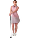 Inphorm MAI 17" Wrap Golf Skirt in Dusty Pink/Latte - model with both hands on a club -front view