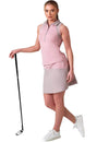 Inphorm MAI 17" Wrap Golf Skirt in Dusty Pink/Latte - model with one hand on a club -front view