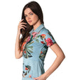 Inphorm Elle Short Sleeve Womens Golf Polo with ½ Zipper in Veridian Floral Print - 3quarter left side view