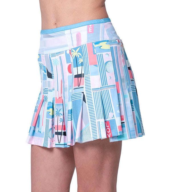 Lucky in Love Linen Nouveau Golf Skort in Periwinkle and pink art graphic resort print - partial model- side view.