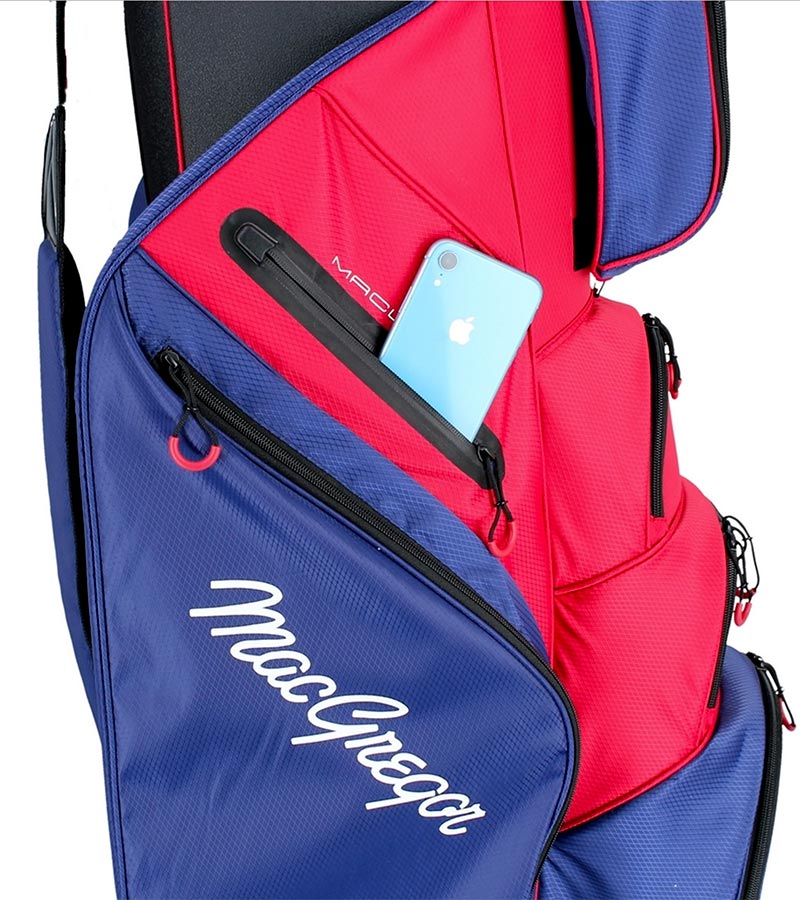 MacGregor MACLOCK Ultimate Divider System Golf Cart Bag - in patriotic red and blue with black accents and white lettering -detail of valuable pocket with a phone