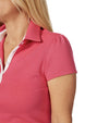 Pirdie June Daly Womens Golf Polo -partial model in Raspberry with closeup puff short sleeve
