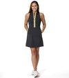 Pirdie Sleeveless Duchess Womens Golf Dress in Black- model showing front with yellow zipper and neckline and arm holes accented in olive green