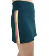 Pirdie Foreplay Skirt in Dark Teal- partial model -3quarter view with kelly green/hot pink/ yellow vertical stripe down the side of the skirt.