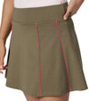 Pirdie Swing Dolly Golf Skirt- partial model-front view in Olive With Hot Pink piping accent