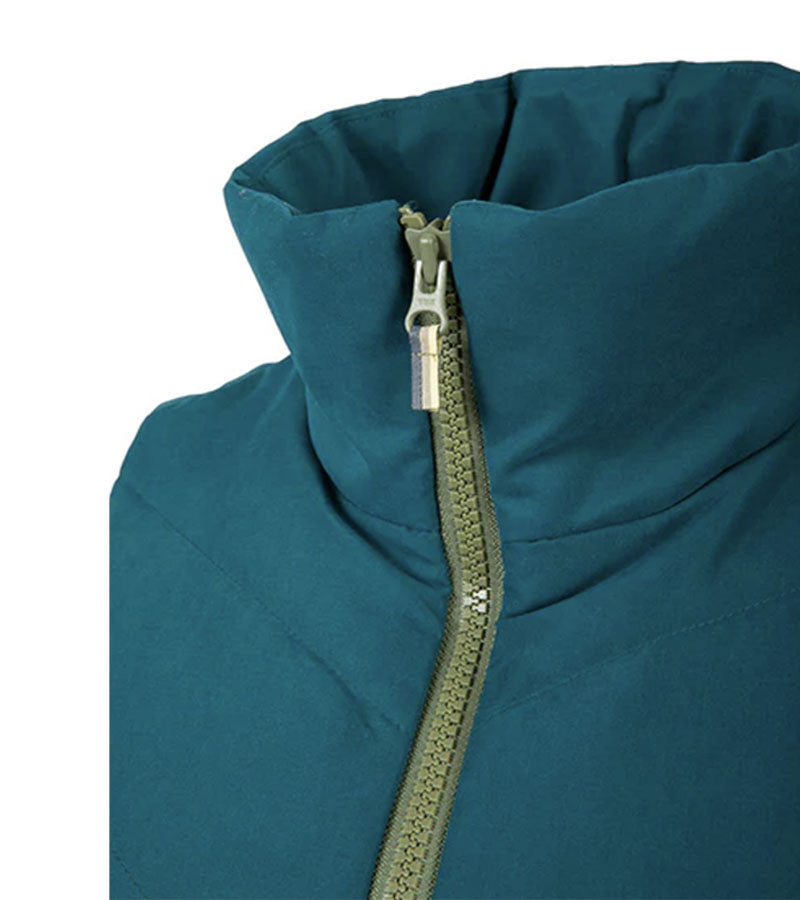 Pirdie Twilight Golf Vest in Dark Teal with accents in Olive Green for the zipper -closeup view