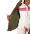 Pirdie Twilight Golf Vest in Olive Green with accents in hot pink for the zipper -partial model holding vest open