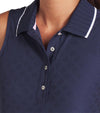 Puma AP Jacquard Sleeveless Women’s Golf Polo in Deep Navy - closeup of collar edged in white and 4 button placket.
