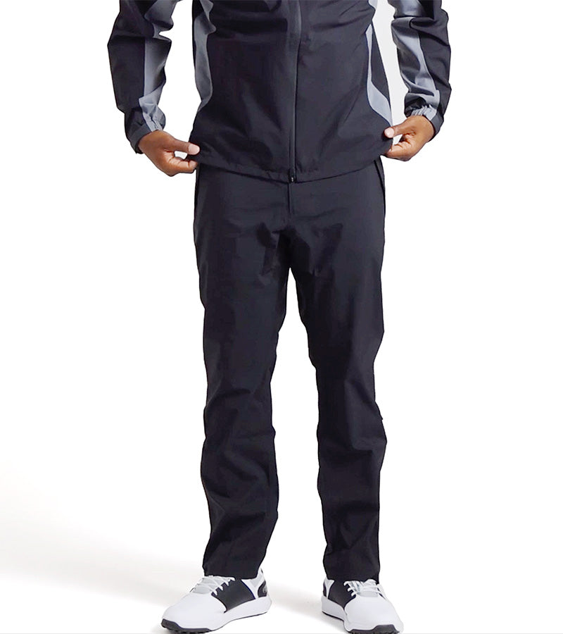 Puma DRYLBL Mens Rain Golf Pants with model in Navy Blazer