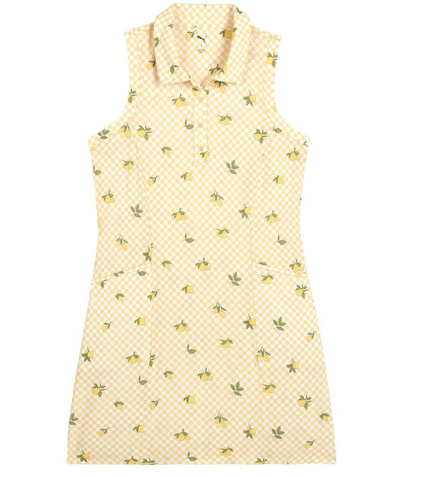 Puma Lemons Woven Womens Golf Dress- front view in Sunny Yellow, an allover lemon print on a cheerful yellow-and-white checkered background.
