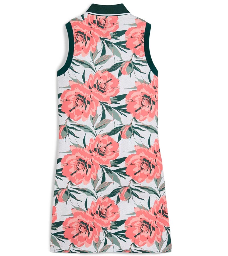 Puma MATTR Beautiful Game Womans Golf Dress in a tropical White Glow / Peach Frost print with green collar and green banded armholes - back view