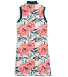 Puma MATTR Beautiful Game Womans Golf Dress in a tropical White Glow / Peach Frost print with green collar and green banded armholes - back view