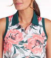 Puma MATTR Beautiful Game Womans Golf Dress in White Glow / Peach Frost showing closeup of the 4 button placket and contrast details of green for the collar and banded arm holes collar