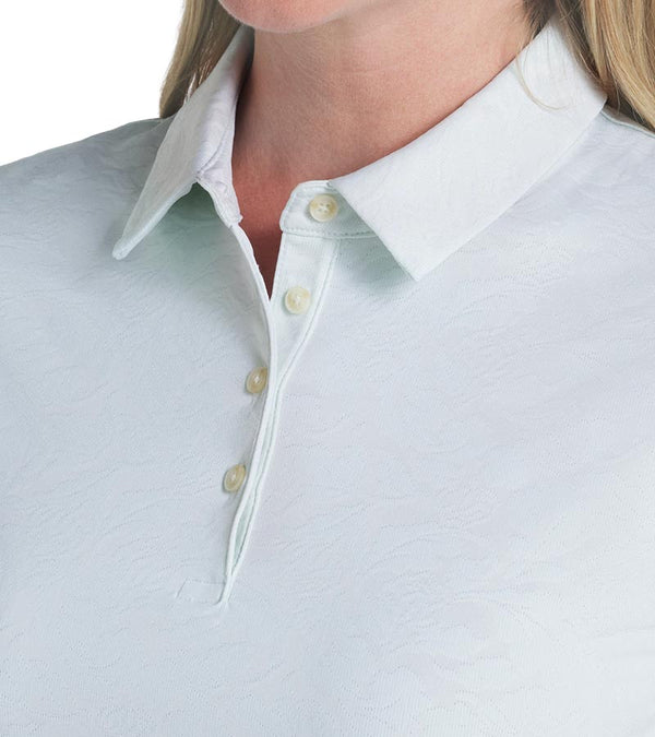 Puma MATTR Lianas Jacquard Womens Golf Polo in Peaceful Blue- closeup of collar and 4 button placket