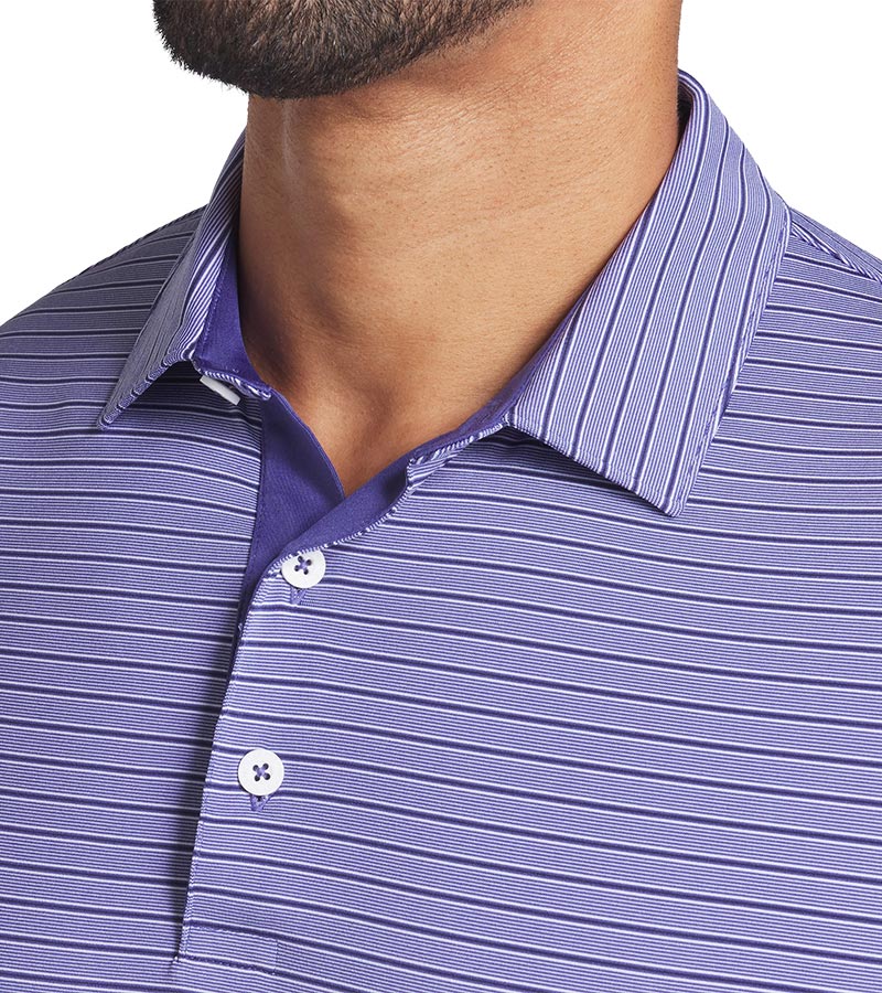 Puma Mens MATTR Bay Golf Polo Model Front in Blue Crystal/Deep Navy with simple thin stripes in 2 different colors. Closeup of the collar and 3-button placket.