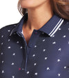 Puma Volition Dancing Stars Short Sleeve Women’s Golf Polo Shirt in Deep Navy with white stars - closeup view of button plakett and collar