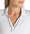 Puma Womens CLOUDSPUN Piped Golf Polo Shirt / Short Sleeve in White Glow with a closeup of the classic collar neckline featuring piped detailing at the V neckline adding a touch of sophistication to the overall design.