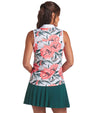 Puma MATTR Hadley Sleeveless Womens Golf Polo Shirt - partial model, back view in White Glow / Peach Frost an an eye-catching floral print in vibrant coral pink and lush green tones