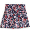 Puma Women’s Sandy Printed Golf Skirt back view in Deep Navy -a bold navy jungle print with playful red giraffes among the foliage