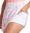 Puma Womens Sandy Printed Golf Skirt in Pink Fruit, a pink floral toile with subtle cats - closeup of under shorts pocket