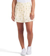 Puma Womens Sandy Printed Golf Skirt in Sunny Yellow, a print of tossed yellow lemons and green leaves against a gingham background - front view of partial model