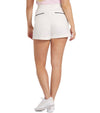 Puma x AP Solid Women’s Golf Shorts- partial model -back in Warm White with contrast navy piping on the pockets