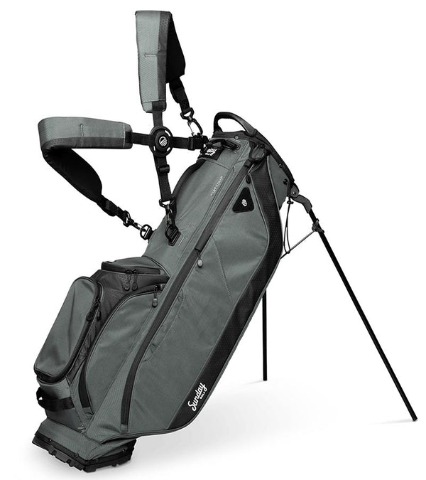 Sunday Golf Ryder Full Size Stand Golf Bag in Midnight Green with legs extended and a backpack-style double strap system