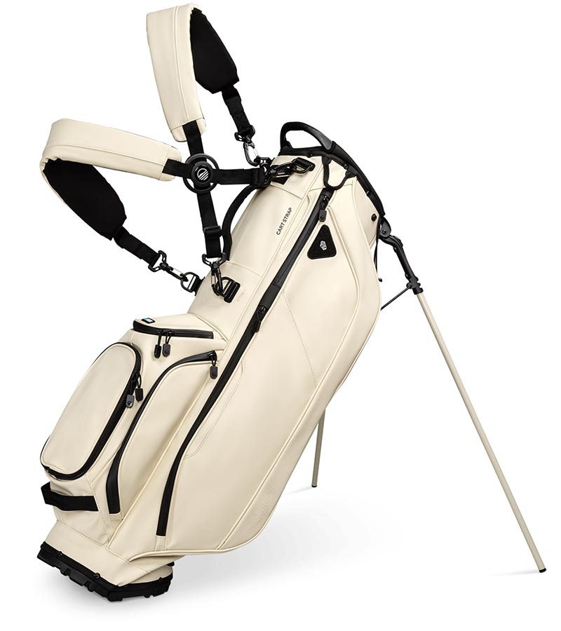 Sunday Golf Ryder S-Class Full Size Stand Golf Bag in Cream Vegan Leather with legs extended and a backpack-style double strap system