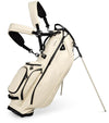 Sunday Golf Ryder S-Class Full Size Stand Golf Bag in Cream Vegan Leather with legs extended and a backpack-style double strap system