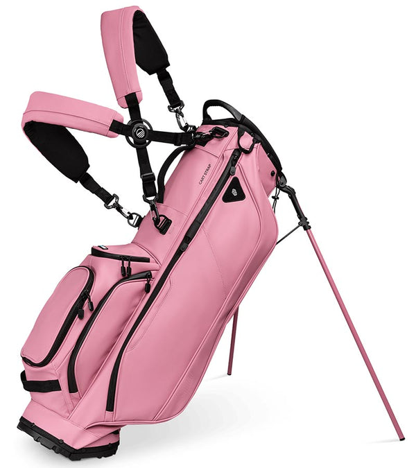Sunday Golf Ryder S-Class Full Size Stand Golf Bag in Dusty Pink Vegan Leather with legs extended and a backpack-style double strap system