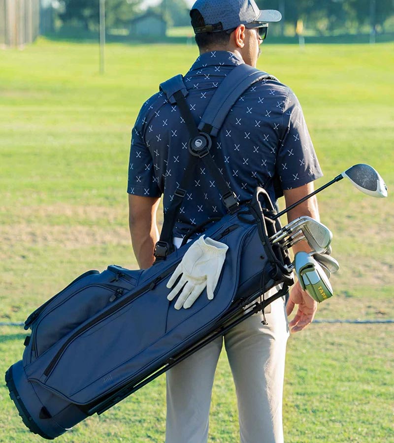 Sunday Golf Ryder S-Class Full Size Stand Golf Bag in Navy Vegan Leather – male golfer on course