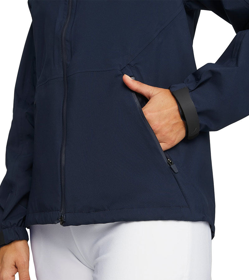 Puma DRYLBL Women's Rain Golf Jacket in navy - closeup detail cuff & front zippered pocket