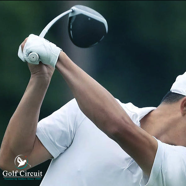 Arms of golfer with back swing with golf driver