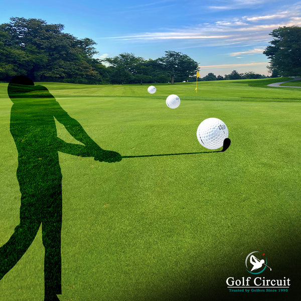 Silhouette of golfer hitting a pull shot on course