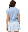 Birdie & Ace Lily Womens Golf Polo in Aura Blue- partial model back view