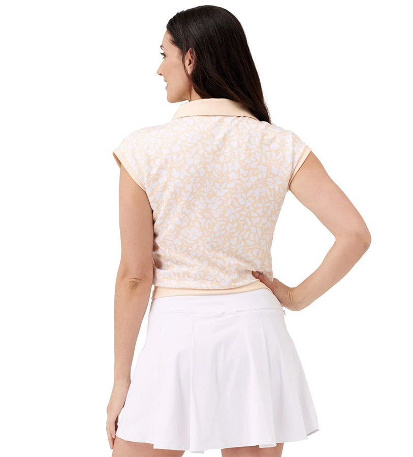 Birdie & Ace Lily Womens Golf Polo in Peach Floral- partial model back view