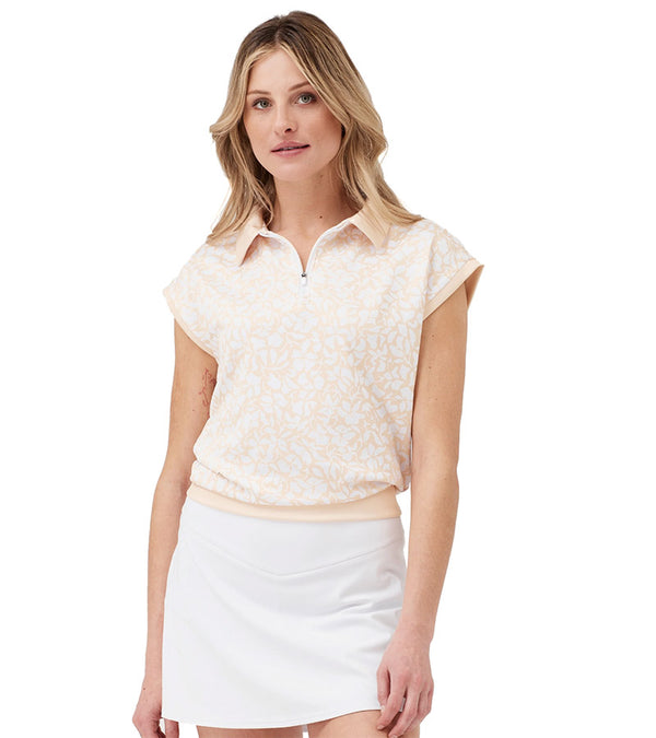 Birdie & Ace Lily Womens Golf Polo in Peach Floral- partial model front view