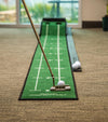 GoSports Pure Putt 9 Ft Indoor Putting Green Mat - closeup of putter with golf ball lined up on mat's alignment line