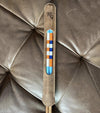 Hazy Golf See Through Leather Alignment Sticks Cover with 2 alignment sticks laying on leather sofa