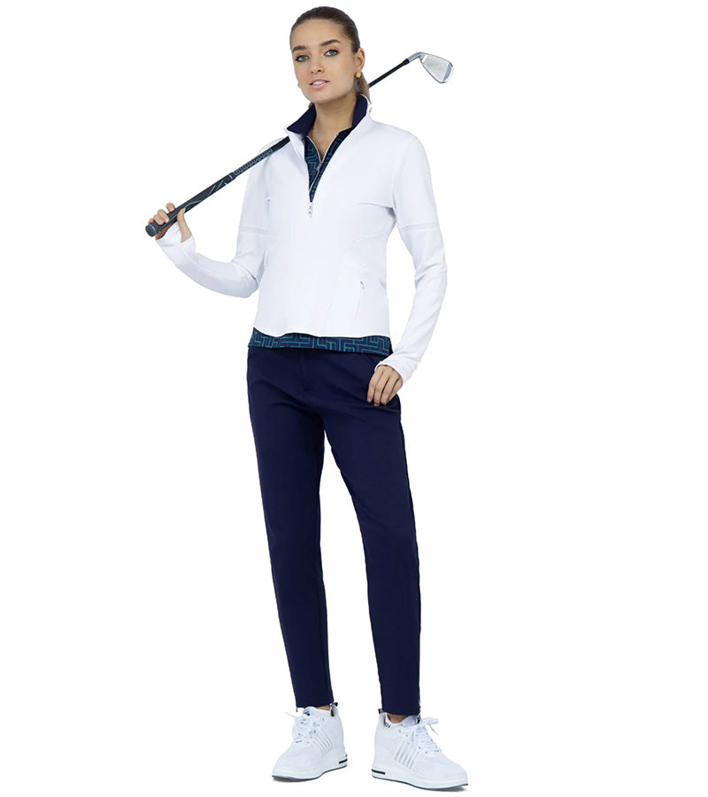 InPhorm Quick Dry Women's Camila Golf Pant in ink. Model front view holding golf club