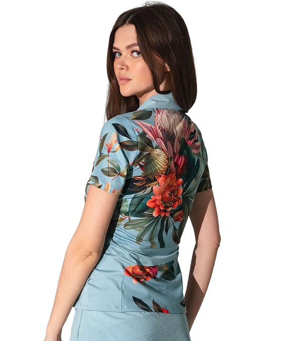 Inphorm Elle Short Sleeve Womens Golf Polo with ½ Zipper in Veridian Floral Print - 3quarter back view