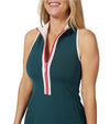 Pirdie Sleeveless Duchess Womens Golf Dress in Dark Teal- partial model closeup of front zipper and neck line accented in white with coral colored zipper