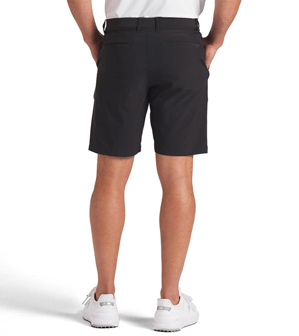 Puma 101 Solid Mens Golf Shorts with  9" inseam in Puma Black - partial model back view