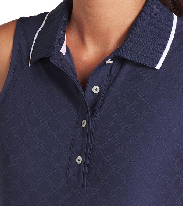 Puma AP Jacquard Sleeveless Women’s Golf Polo in Deep Navy - closeup of collar edged in white and 4 button placket.